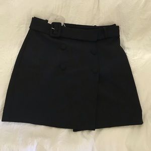 Black belted mini skirt